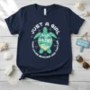 Turtle graphic with "Just A Girl Who Loves Beaches And Turtles" text in a circle, featuring a beach scene inside