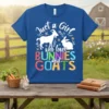 T-shirt with white text "Just a Girl who loves" above colorful block letters spelling "BUNNIES" and "GOATS", featuring silhouette graphics
