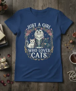 Just a Girl Who Loves Cats text with three illustrated cats and floral border on a navy blue t-shirt