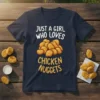 Just A Girl Who Loves Chicken Nuggets t-shirt design with pile of golden nuggets graphic