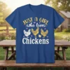 T-shirt with text "JUST A GIRL who loves Chickens" and illustrations of chickens and hearts