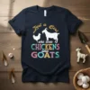 Just a Girl Who Loves Chickens and Goats text with chicken and goat graphics on a navy t-shirt