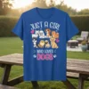 Just A Girl Who Loves Dogs t-shirt with a collection of cartoon dogs and pink hearts