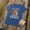 Just A Girl Who Loves Foxes T-Shirt featuring a cute fox illustration and pink hearts