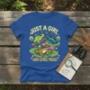 Just a girl who loves frogs t-shirt design with three colorful frogs on lily pads and pink flowers