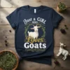 Just a Girl Who Loves Goats text design with a cute white goat inside a leafy wreath, on a navy