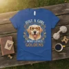 Just A Girl Who Loves Goldens t-shirt design featuring a smiling golden retriever wearing glasses