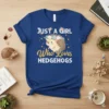 Just A Girl Who Loves Hedgehogs text with a cute hedgehog wearing a flower crown on a royal blue t-shirt