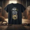 Black t-shirt featuring the text "Just a Girl Who Loves Horses" with a golden horseshoe and horse head graphic