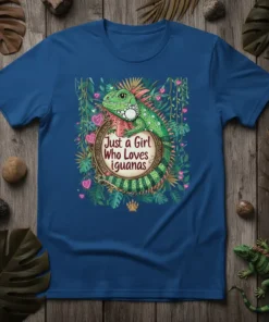 Just a Girl Who Loves Iguanas quote on a t-shirt featuring a green iguana surrounded by jungle foliage and pink