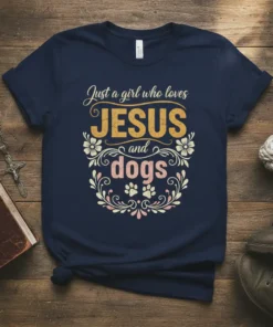Just a girl who loves JESUS and dogs text design with floral accents and paw prints on a navy t-shirt