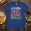 Just a Girl Who Loves Jesus and Pickles quote on a royal blue t-shirt with a pickle jar graphic