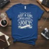 Just A Girl Who Loves Joey text in a vintage style font on a royal blue t-shirt