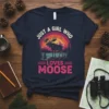 Just a Girl Who Loves Moose text with a graphic of a moose in a mountain landscape at sunset