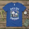 T-shirt with white text "Just a Girl who loves Pandas" above two cute pandas sitting among bamboo and pink flowers