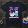 Cute graphic tee featuring neon text "Just A Girl Who Loves Ramen & Boba" with kawaii ramen bowl and boba