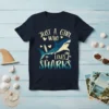 Navy t-shirt with "Just A Girl Who Loves Sharks" text and a shark graphic, hearts, and palm trees