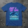 Just A Girl Who Loves Sharks text with a detailed shark illustration on a blue t-shirt
