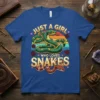 Just A Girl Who Loves Snakes text with a green snake and roses graphic on a blue t-shirt