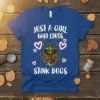 Just a girl who loves stink bugs quote with a detailed stink bug graphic and pink hearts on a royal