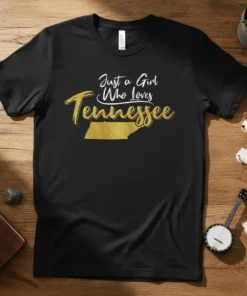 Just a Girl Who Loves Tennessee text design with golden state outline graphic on black t-shirt