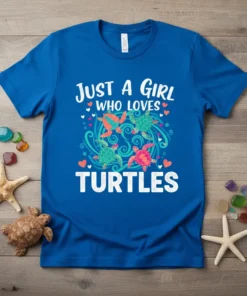 Blue t-shirt with white text "JUST A GIRL WHO LOVES TURTLES" and colorful sea turtle graphics