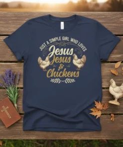 Navy blue t-shirt with gold text that reads "Just a Simple Girl Who Loves Jesus Jesus & Chickens" and graphics