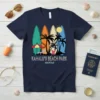 Navy t-shirt featuring "Kahalu'u Beach Park Hawaii" text with colorful surfboards, palm trees, and sun graphic