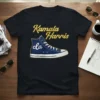Kamala Harris cla t-shirt design with a blue sneaker and gold glitter text "Kamala Harris"