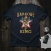 Karaoke King t-shirt design featuring a golden vintage microphone, star graphic, and bold text