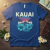 Kauai Hawaii t-shirt with tropical beach scene, palm trees, hibiscus flowers, and a sailboat at sunset