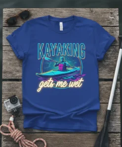 Blue t-shirt with "KAYAKING gets me wet" text and graphic of a person kayaking