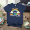 Keep Calm I'm The Gay Sister Everybody Talks About quote with rainbow and clouds graphic on a navy blue t-shirt