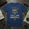 Keep Calm and Call An Airstrike text with fighter jet graphic on navy blue t-shirt