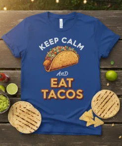 Keep Calm And Eat Tacos text with a detailed taco graphic on a royal blue t-shirt