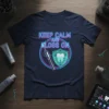 Keep Calm and Floss On t-shirt design featuring neon text, a floss dispenser, and a tooth graphic inside a shield