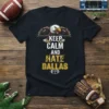 Keep Calm And Hate Dallas text design with an eagle graphic and football emblem on a black t-shirt