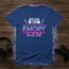 Blue t-shirt with "KEEP CALM AND LET EMORY Handle That!" text in retro pink and blue gradient, with lightning bolt