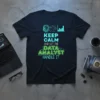 Keep Calm and Let the Data Analyst Handle It quote on a dark t-shirt with neon green and blue circuit