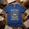 Keep Calm and Pretend Creetend It's On The Lesson Plan quote on a royal blue t-shirt with ornate design and