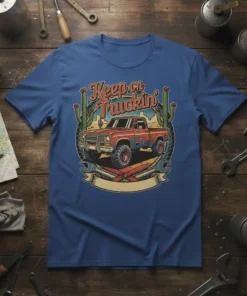 Keep on Truckin' vintage truck design with flames and cacti on a blue t-shirt