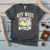 Key West Florida Est 1828 t-shirt featuring a slice of Key Lime Pie, a seashell, and vintage text