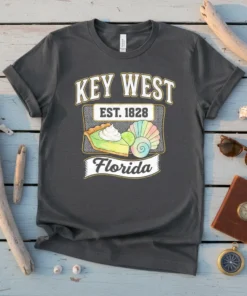 Key West Florida Est 1828 t-shirt featuring a slice of Key Lime Pie, a seashell, and vintage text