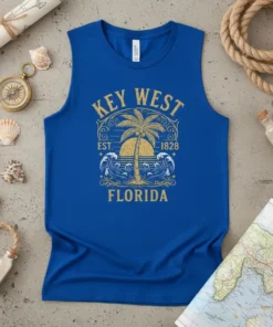 Key West Florida vintage graphic tee with palm tree, sunset, and waves design. Includes EST. 1828 text