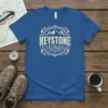 Keystone Colorado t-shirt design featuring mountains, trees, and decorative border