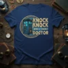 Doctor Who TARDIS "Knock Knock Who's There? Doctor" quote design on a navy blue t-shirt