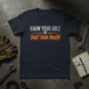 Know Your Role Shut Your Mouth T-Shirt with skull graphic, featuring bold orange and gray text on a navy shirt