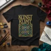 Black t-shirt featuring the golden text "KUNST KLIMT" above a colorful, circular stained-glass-style Art Nouveau design