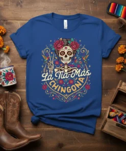 La Tía Más Chingona t-shirt design featuring a sugar skull with flowers and the text "La Tía Más Chingona"