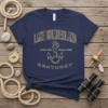 Navy blue t-shirt with gold text "Lake Cumberland Unsalted Shark Free Kentucky" and an anchor graphic